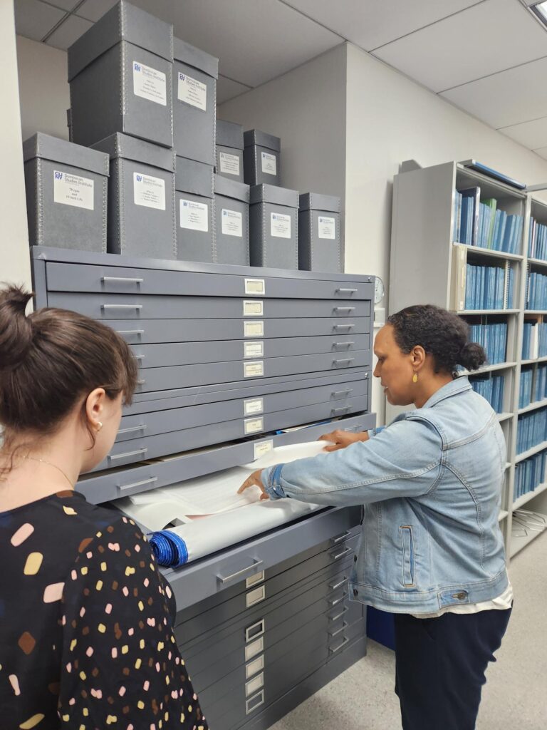 Outreach & Processing Archivist Regina Carra on a tour of the Dominican Studies Institute Archives with Chief Librarian Sarah Aponte